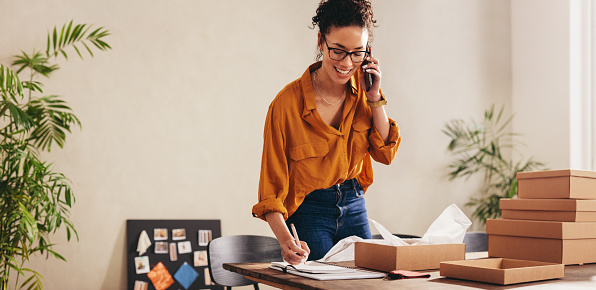 Woman working from home using FTC Premium Wi-Fi Service